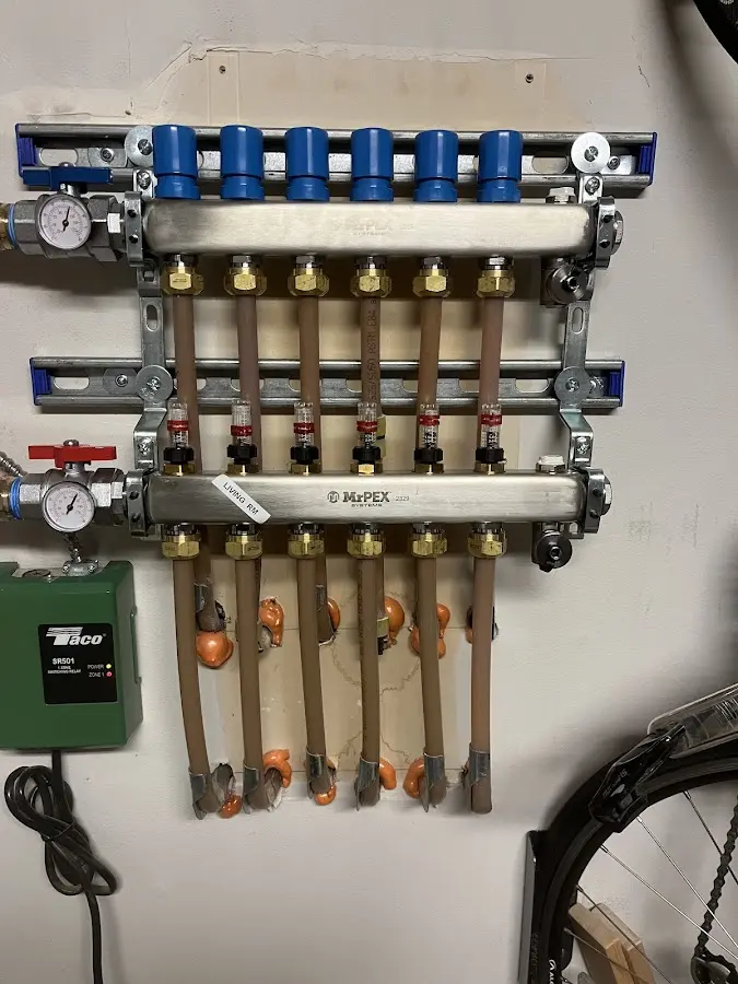 Plumber performing Gas Line Installation at a residential property in Enfield